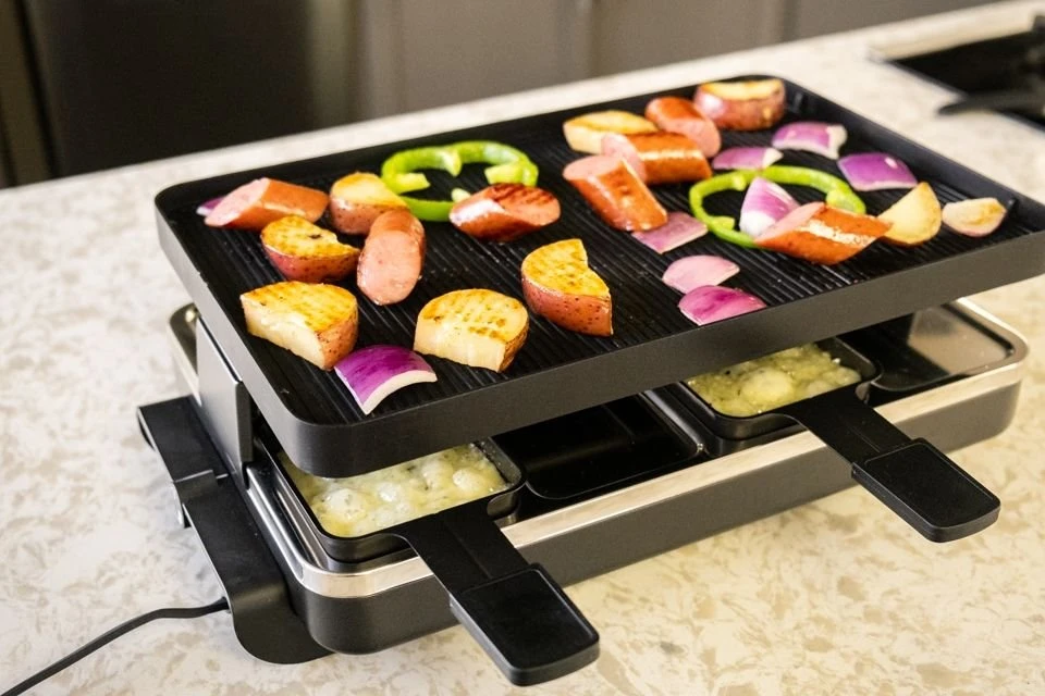 Swissmar Classic Raclette Grill - Black Non-Stick Reversible - 8 Person 4 Swissmar Classic Raclette Grill - Black Non-Stick Reversible - 8 Person - Image 2
