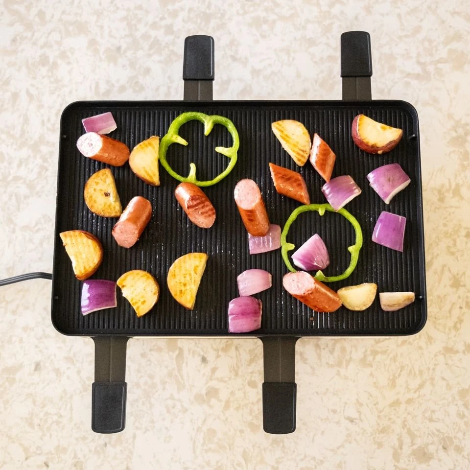 Swissmar Classic Raclette Grill - Black Non-Stick Reversible - 8 Person 5 Swissmar Classic Raclette Grill - Black Non-Stick Reversible - 8 Person - Image 3